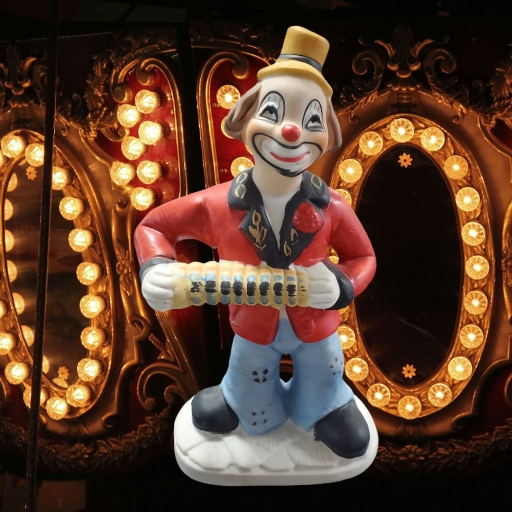 Clown playing accordion